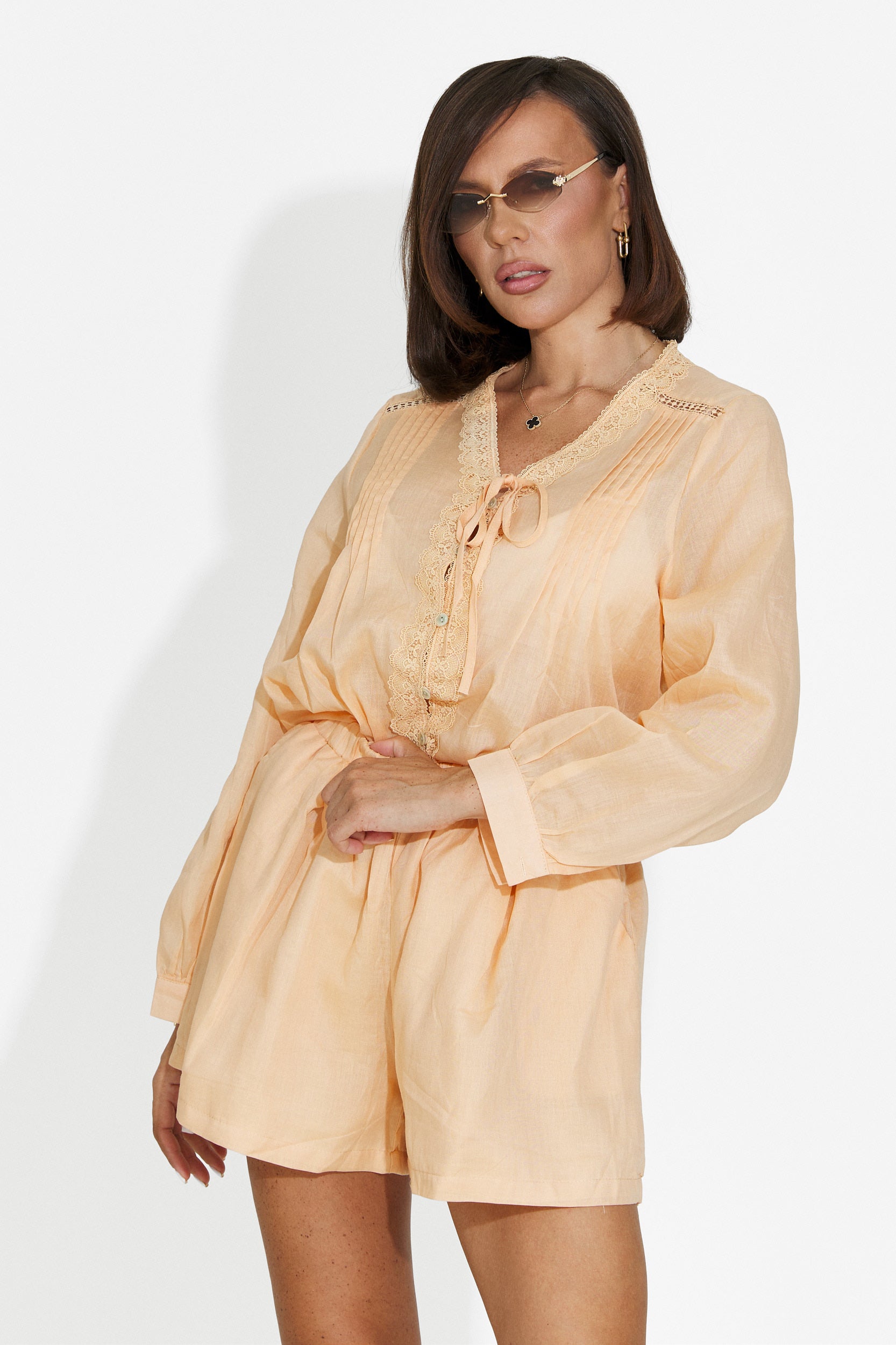 Completo donna con pantaloncini arancione Lekana Bogas