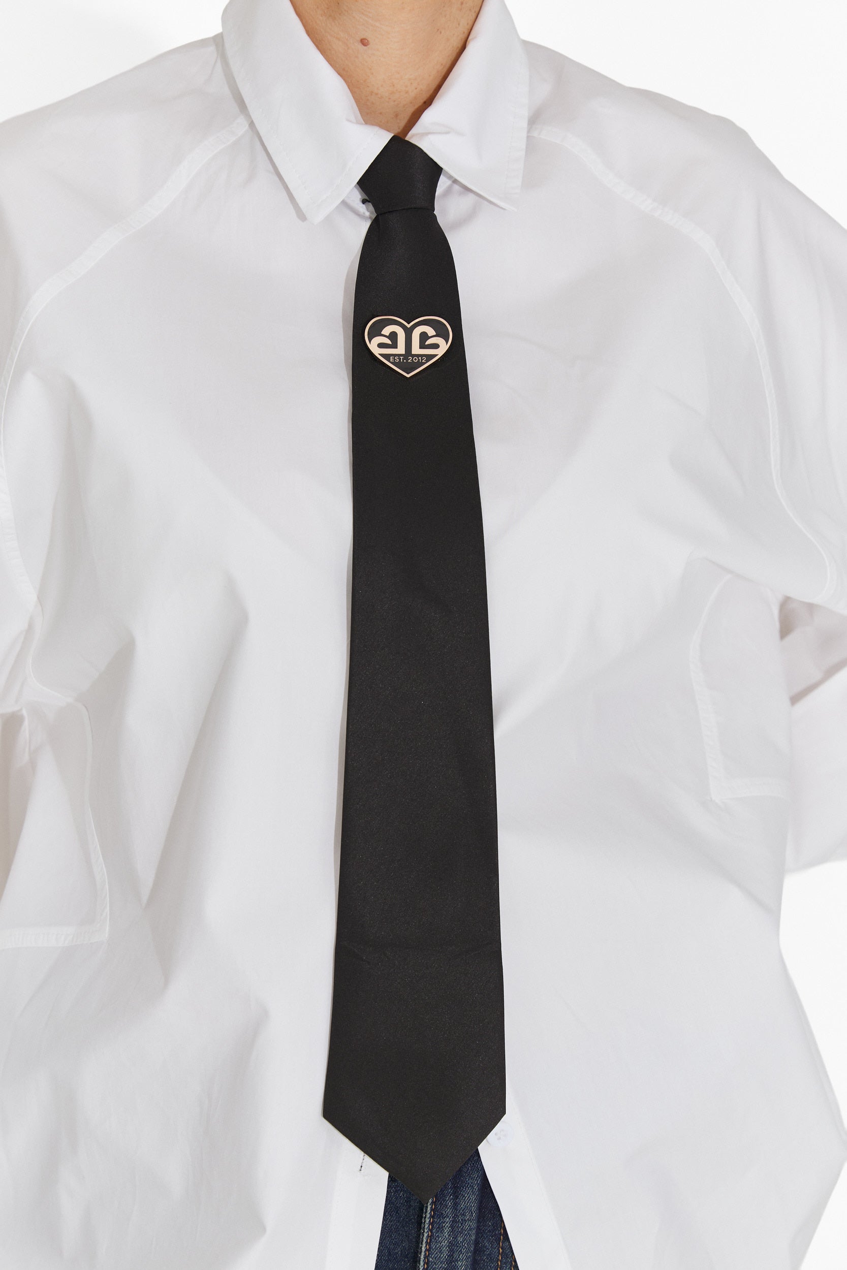 Elegante cravatta dorata nera da donna Enania Bogas