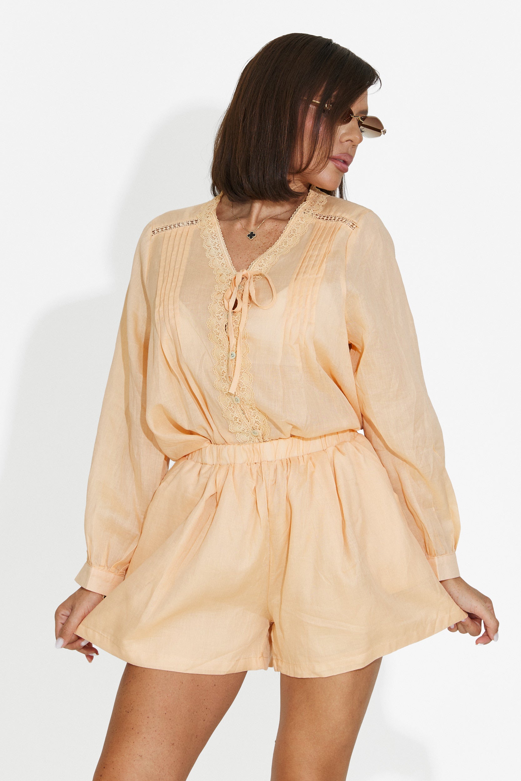 Completo donna con pantaloncini arancione Lekana Bogas