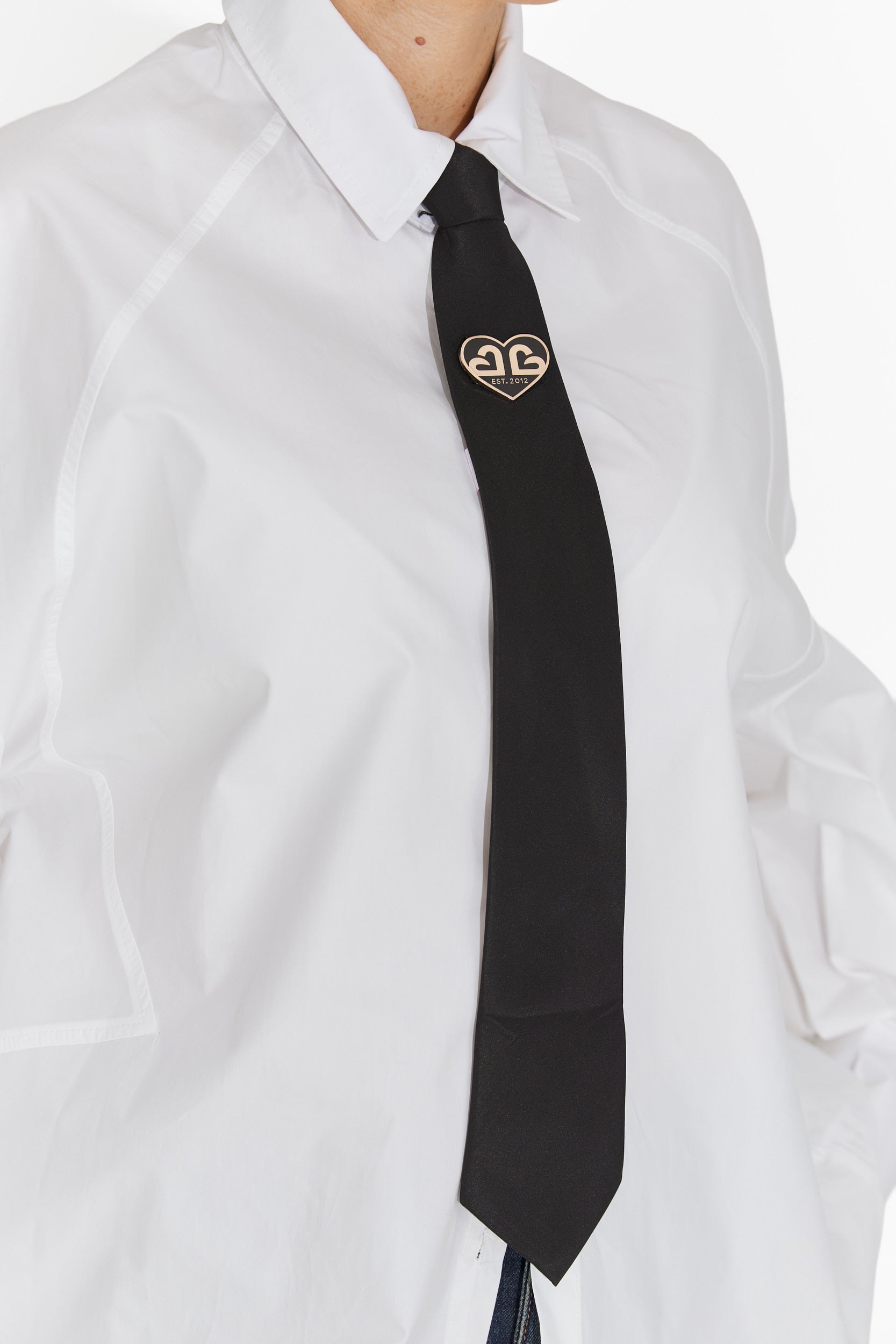 Elegante cravatta dorata nera da donna Enania Bogas